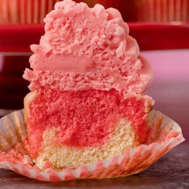 Cupcake with a bite out of it,