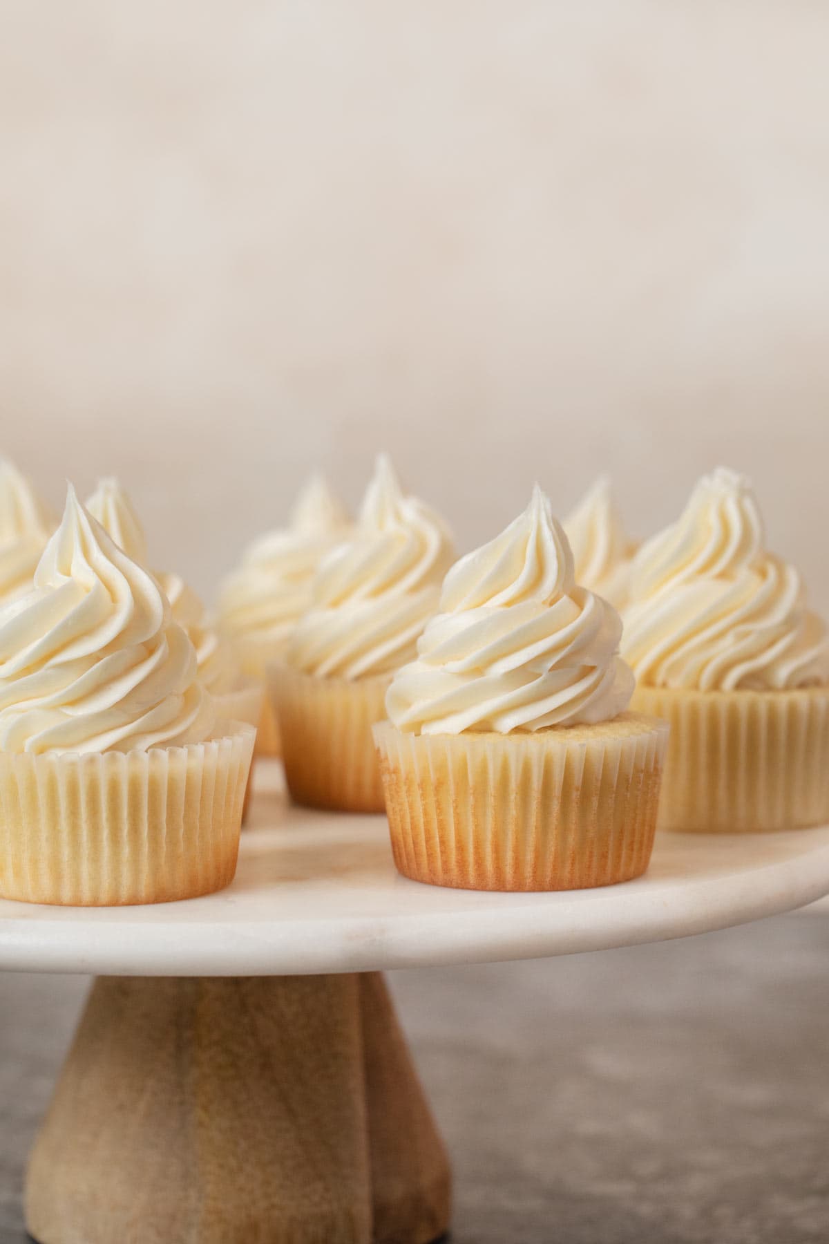 Vanilla Cupcakes on cake stand