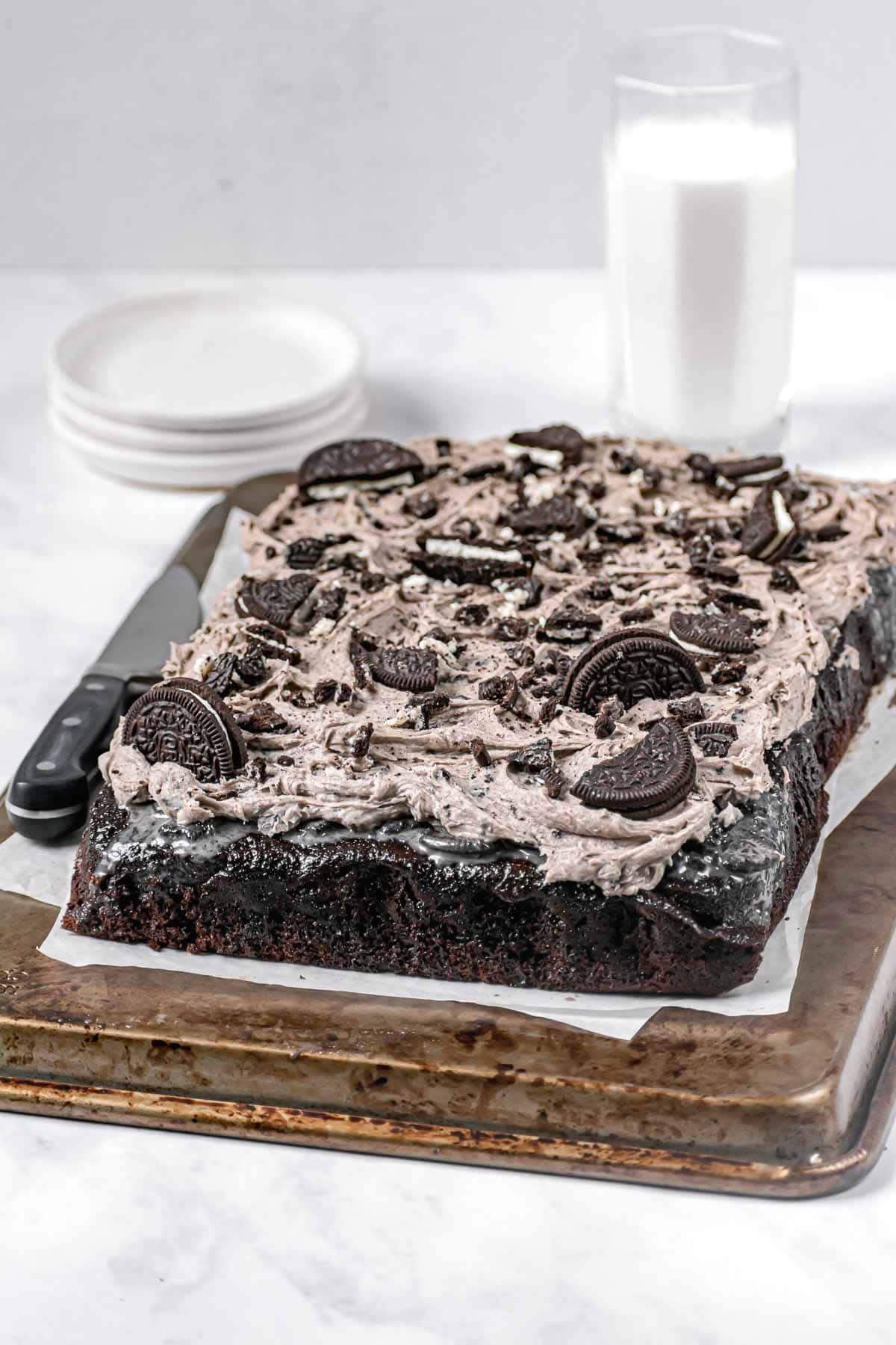 Oreo Poke Cake on serving board