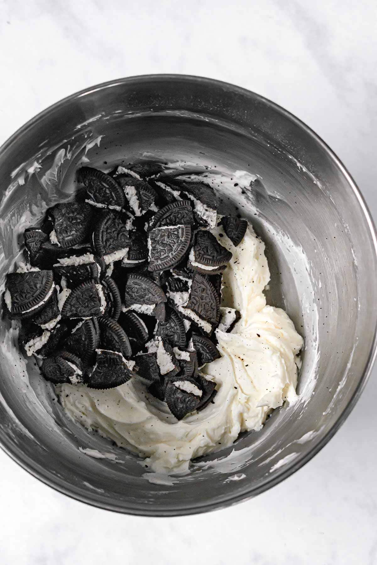 Oreo Poke Cake ingredients in mixing bowl