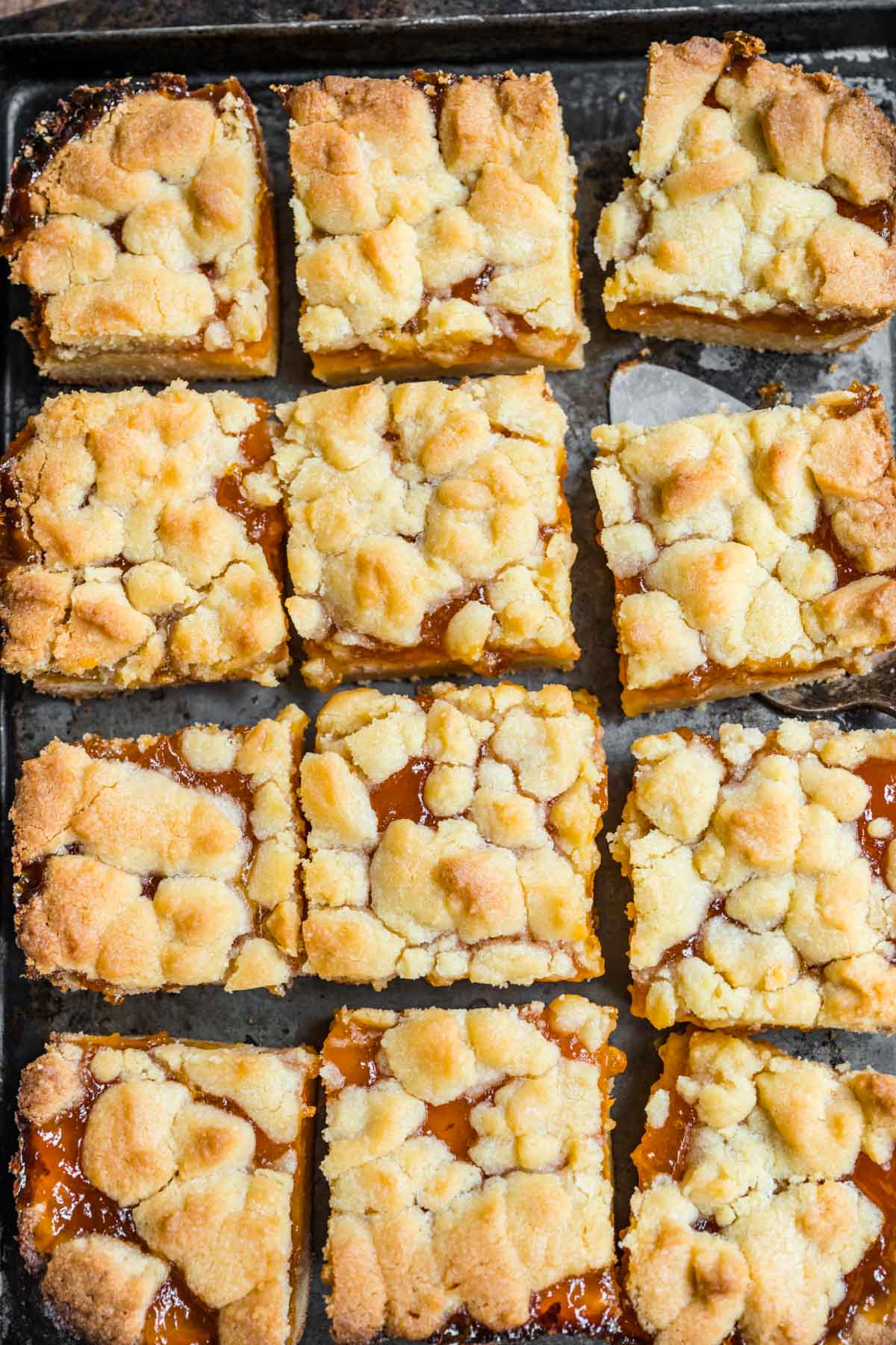 Apricot Shortbread Bars sliced on baking sheet