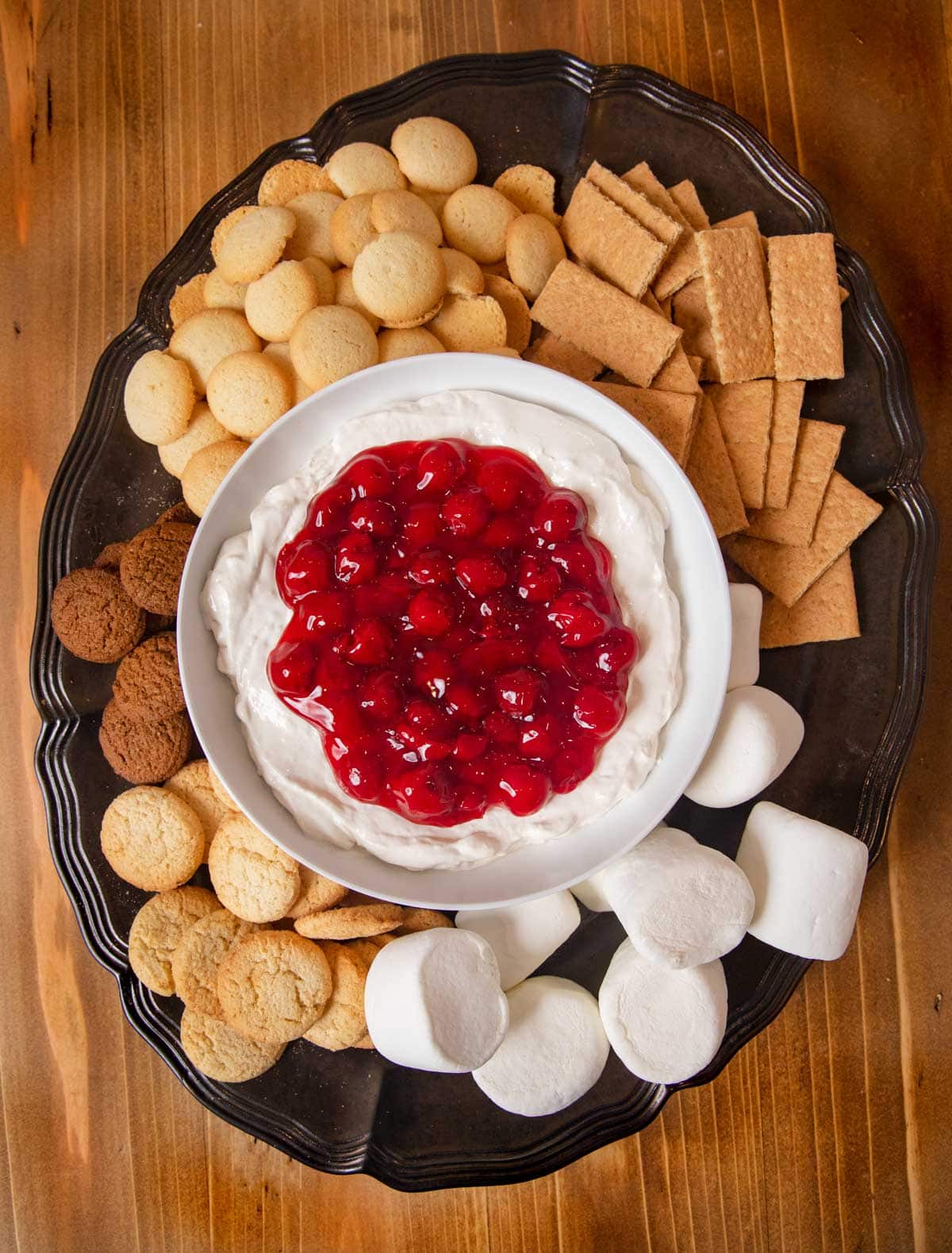 Cherry Cheesecake Dip on dessert platter with assorted dippers