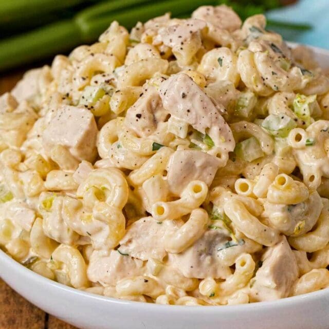 Prepared pasta salad piled in serving bowl