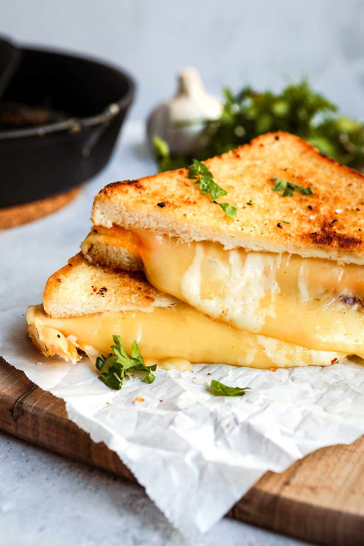 Garlic Butter Four Cheese Grilled Cheese cooked, slices stacked on each other