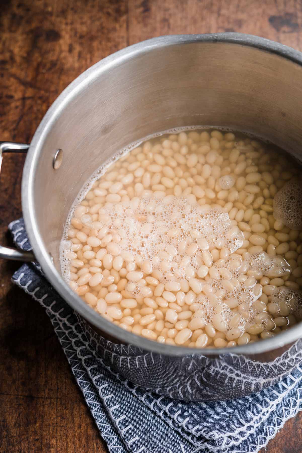 Homemade Pork and Beans dried beans and water in pot