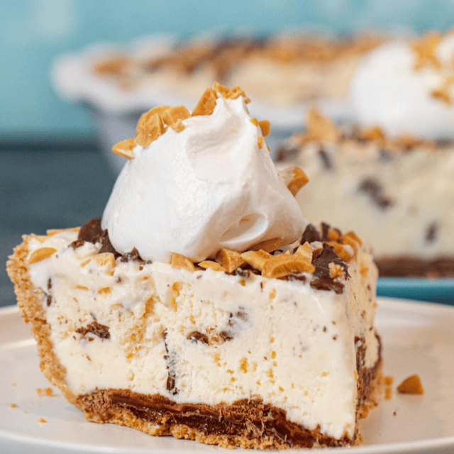 Single slice of Ice Cream Pie on plate topped with whipped cream