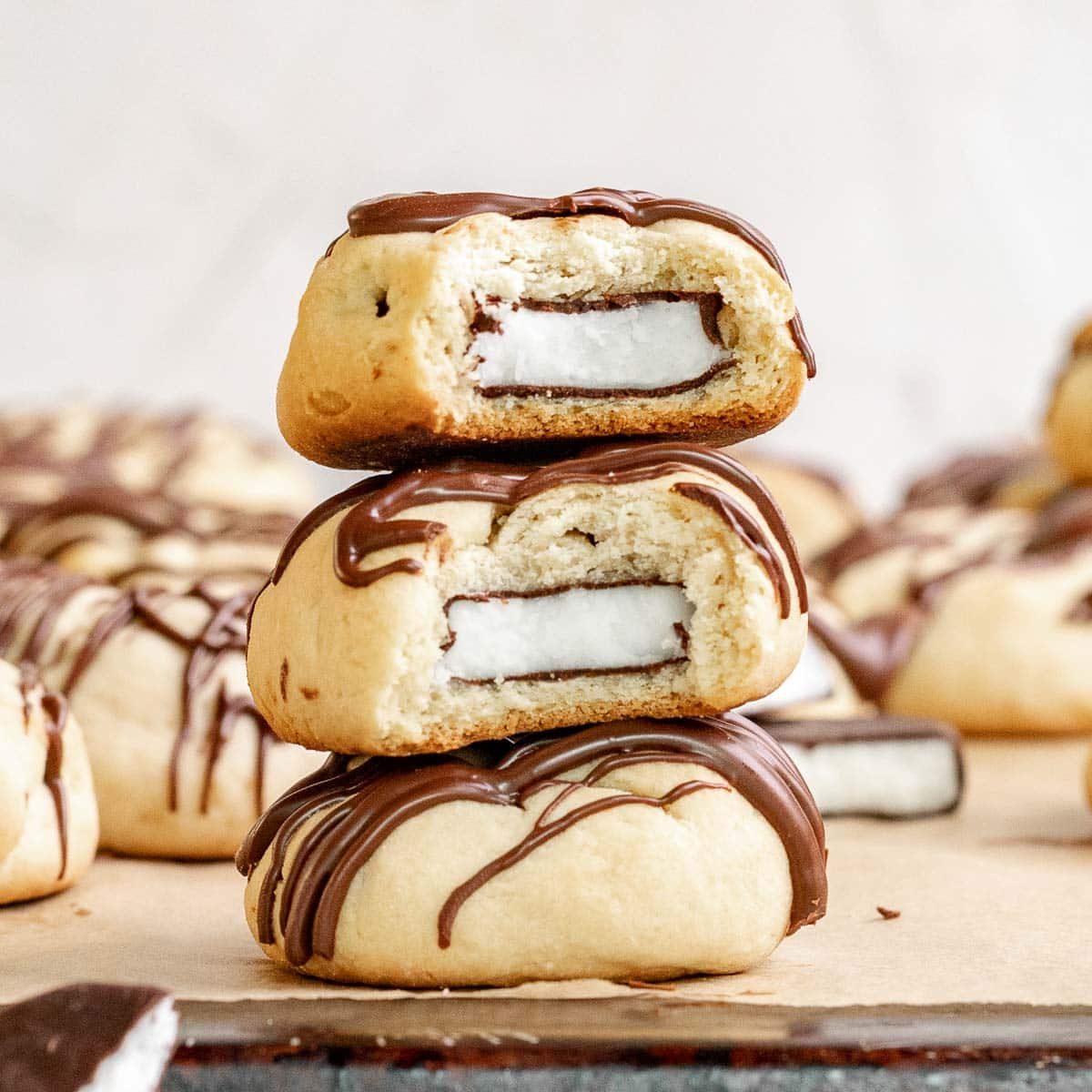 Peppermint Filled Cookies three cookies with bites taken in a stack