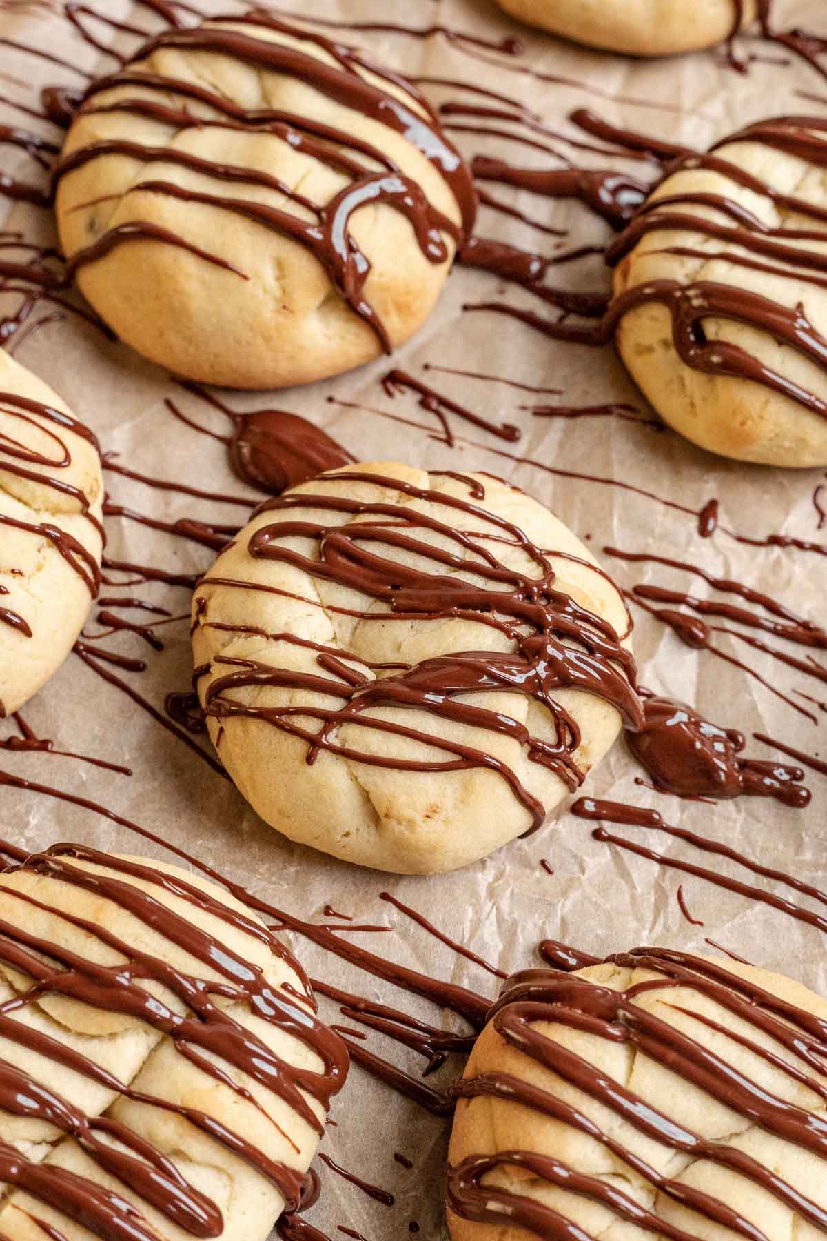 Peppermint Filled Cookies on baking sheet with chocolate drizzle