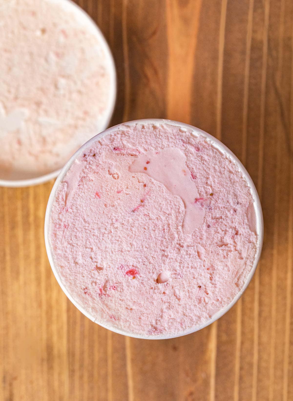 Strawberry Ice Cream in ice cream freezer carton