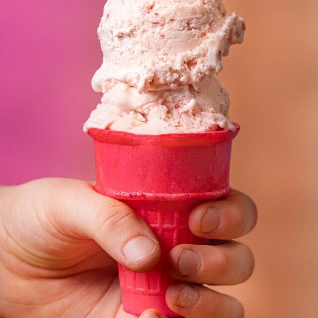 Strawberry Ice Cream scoops on cone