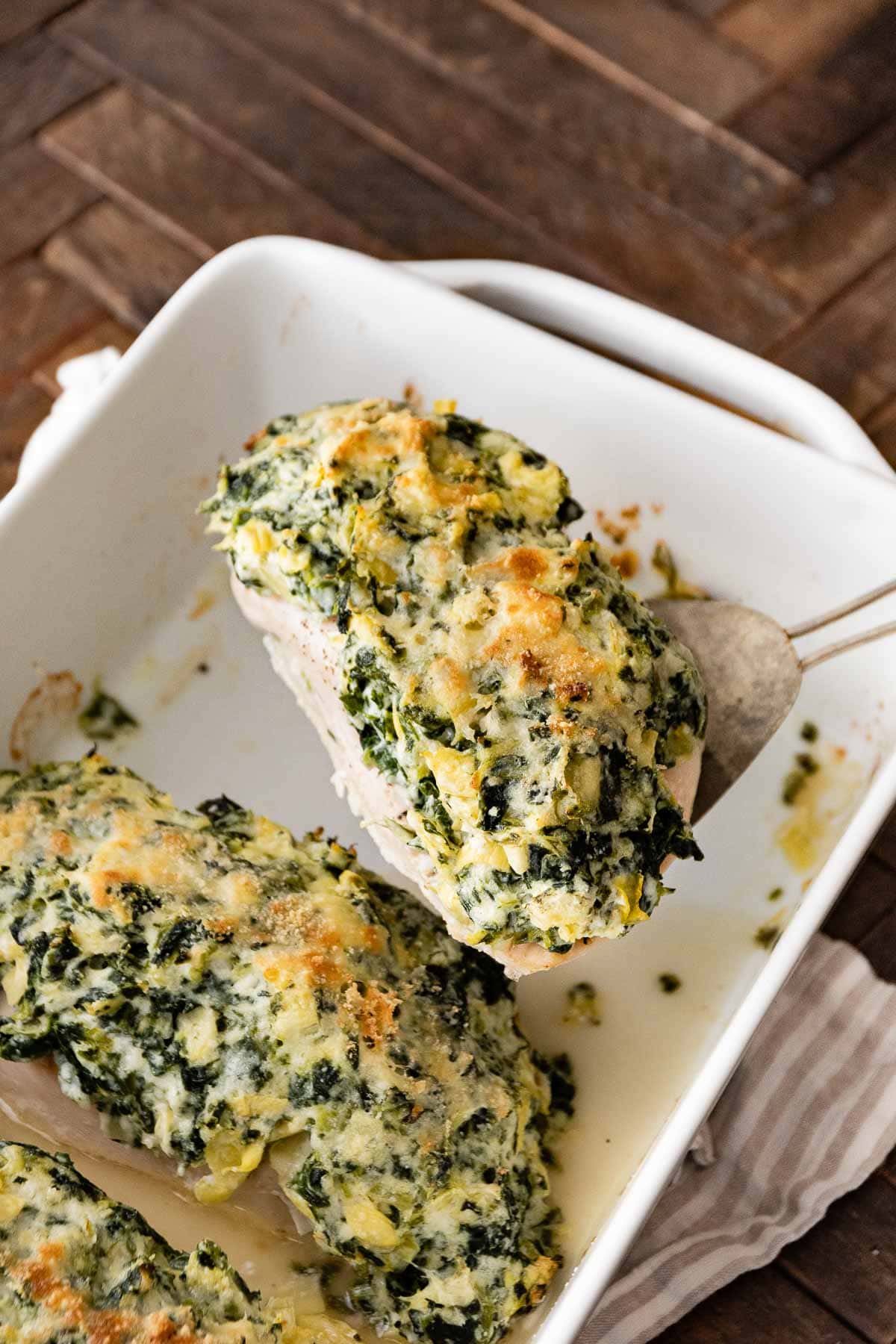 Baked Spinach Artichoke Chicken in baking dish