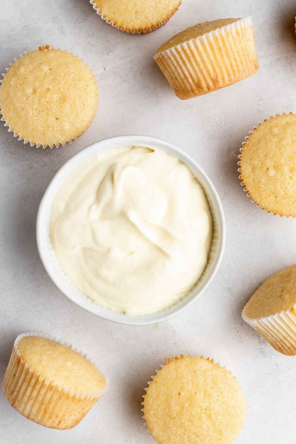 Boston Cream Cupcakes vanilla cupcakes with bowl of custard filling