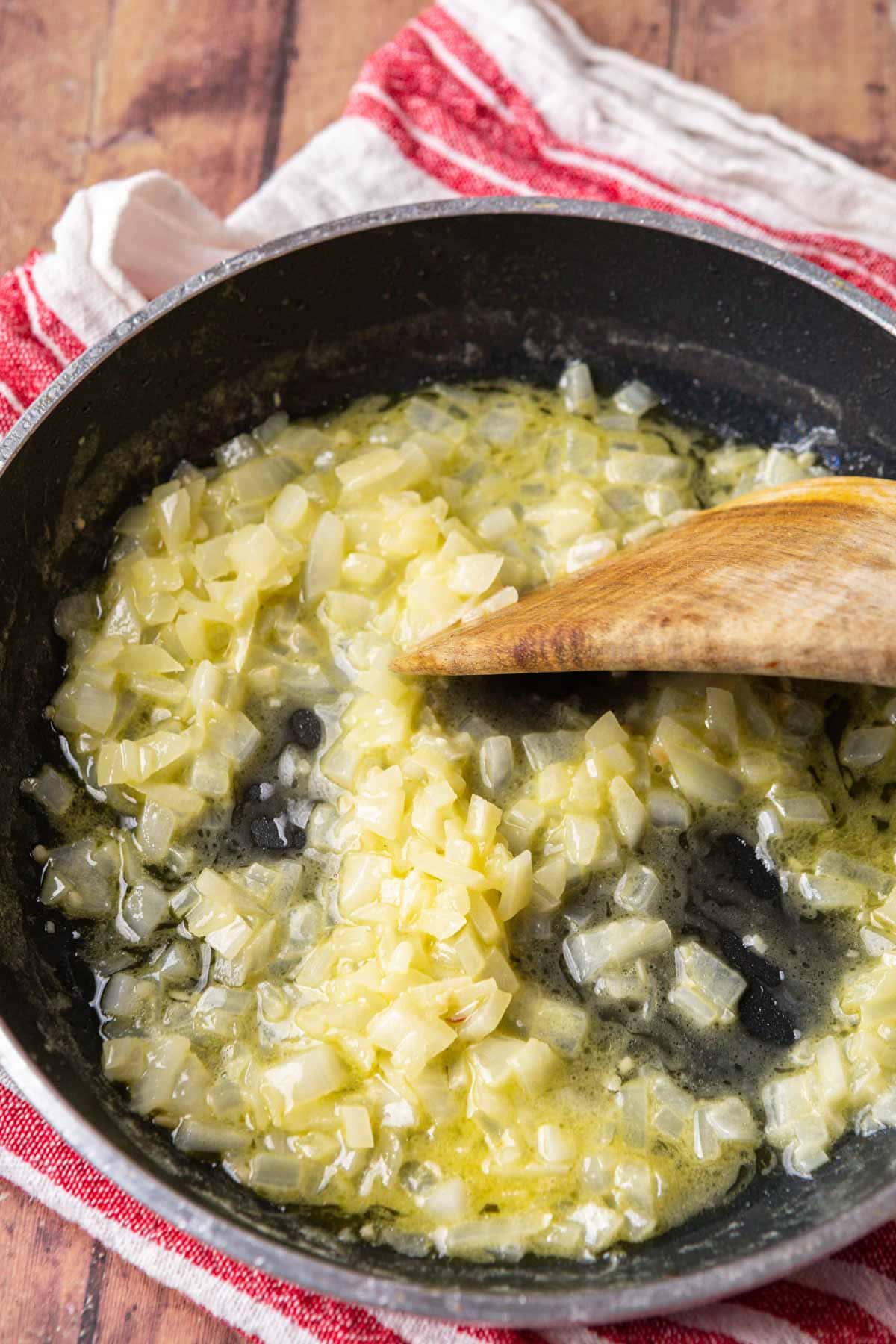 sauteing onions in a skillet