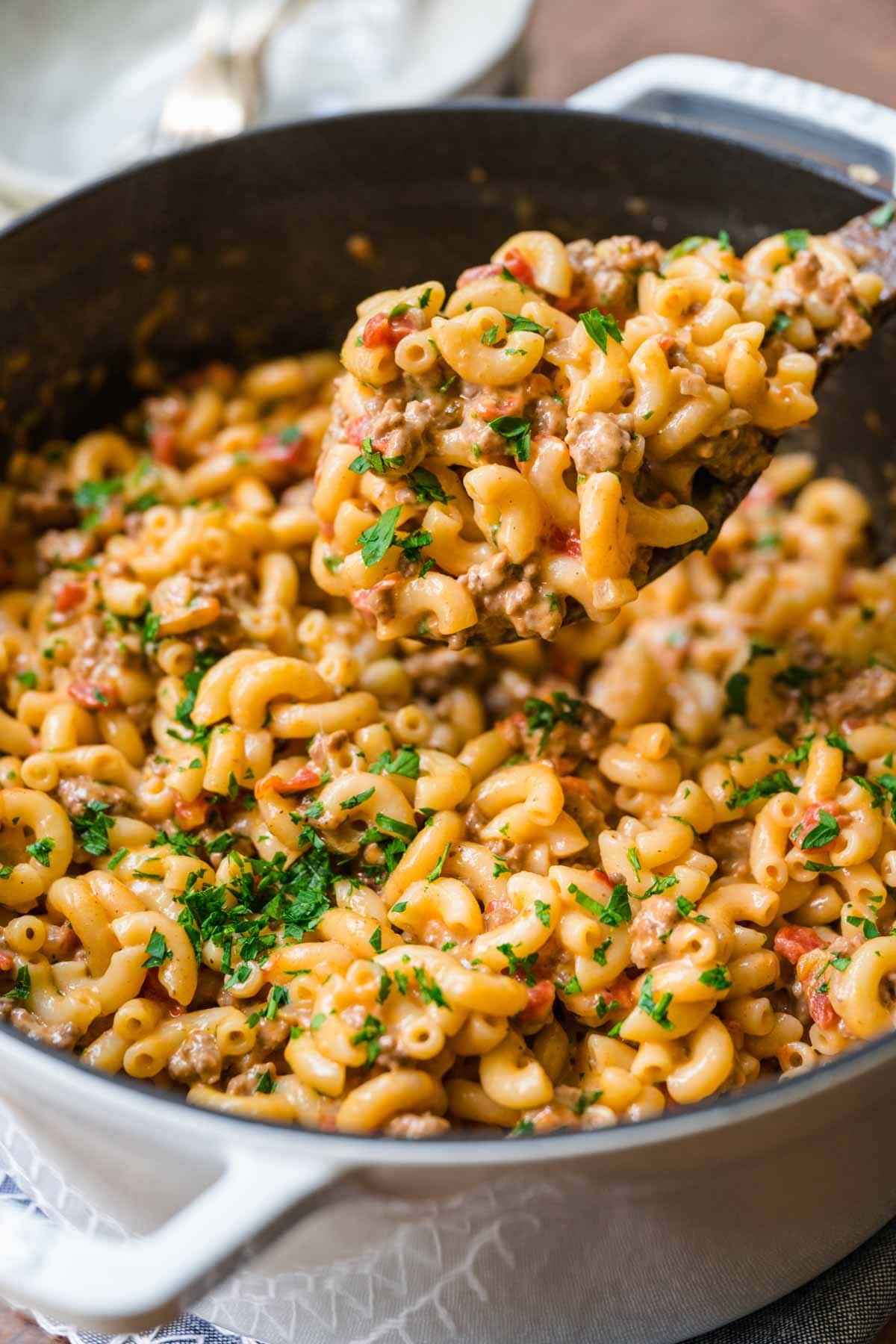 Cheeseburger Pasta with parsley garnish in pot