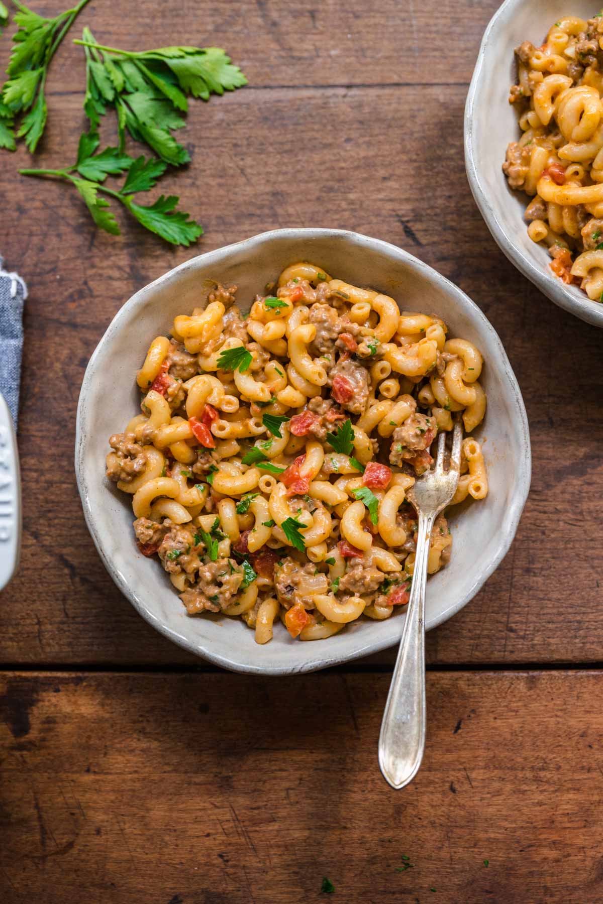 Cheeseburger Pasta with parsley garnish in serving bowl