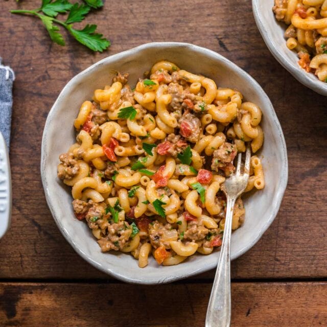 Cheeseburger Pasta with parsley garnish in serving bowl