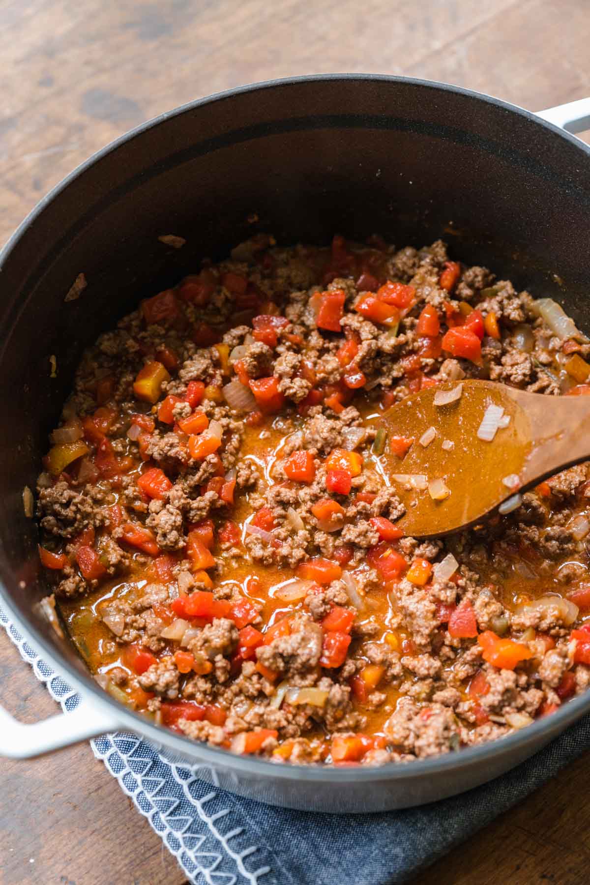 Ground beef with onions and tomatoes for Cheeseburger Pasta