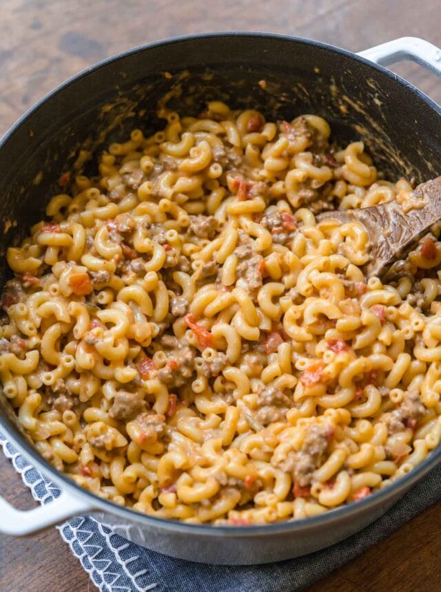 Macaroni and ground beef mixture in pan for Cheeseburger Pasta