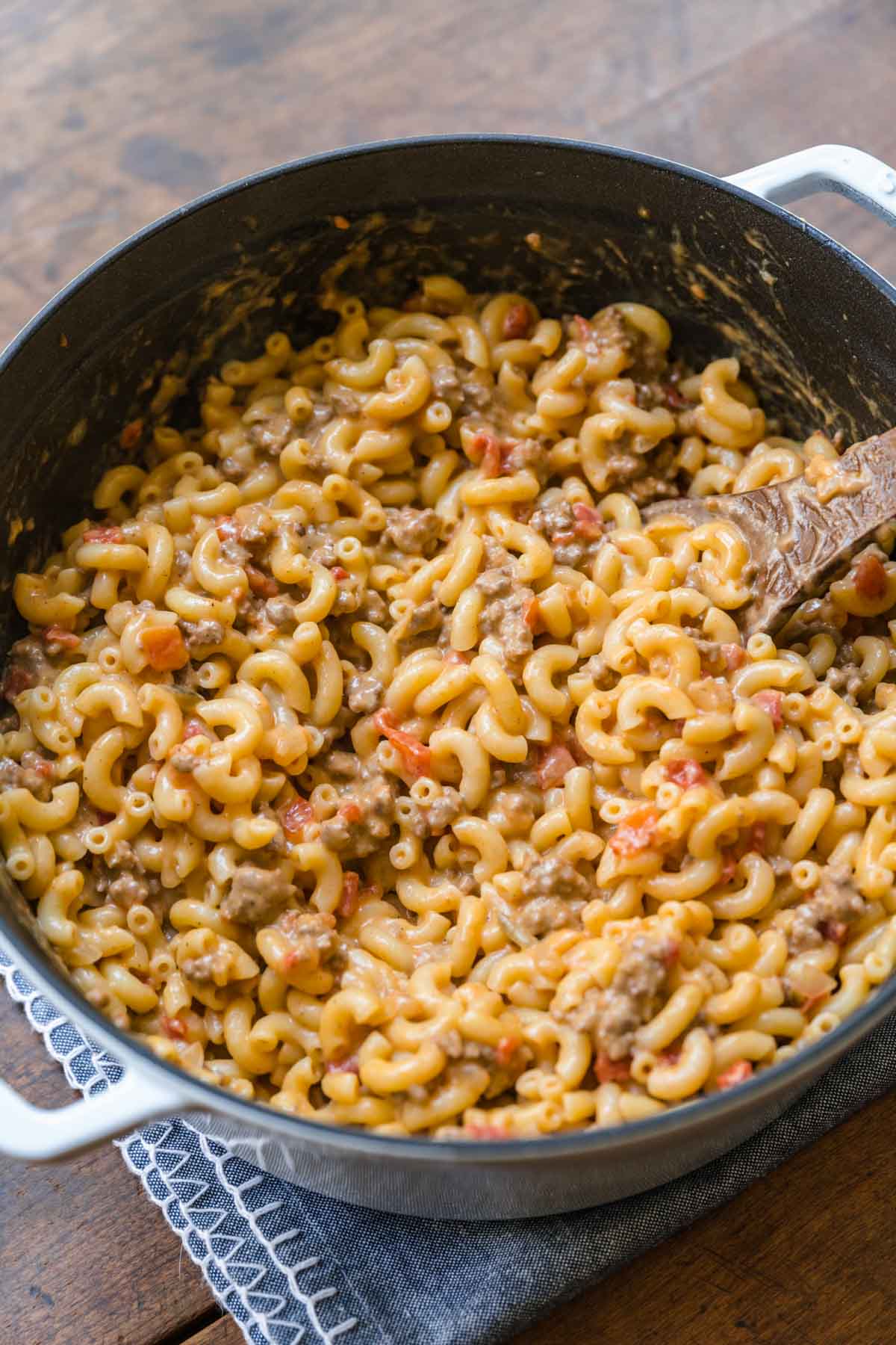 Macaroni and ground beef mixture in pan for Cheeseburger Pasta