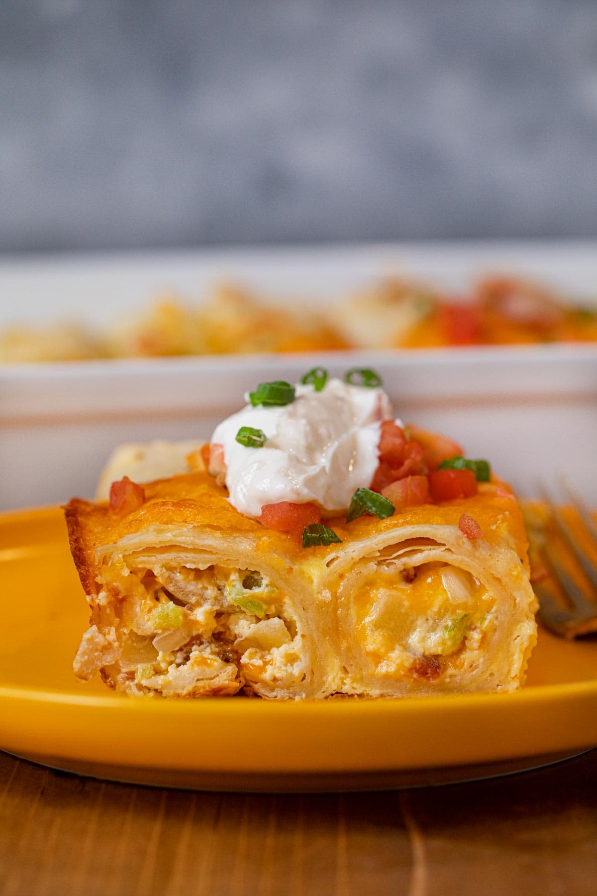 Cheesy Breakfast Enchiladas served on plate