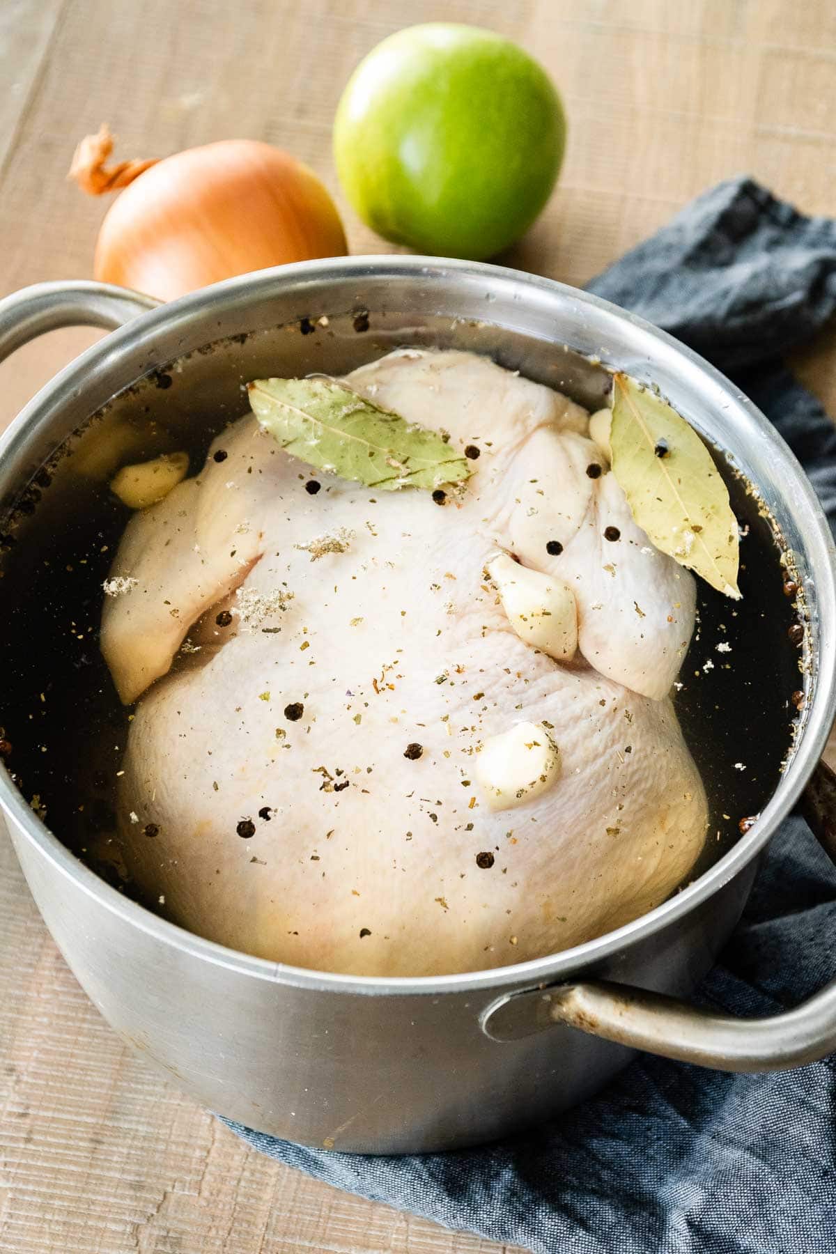 Chicken Brine in stockpot with whole chicken