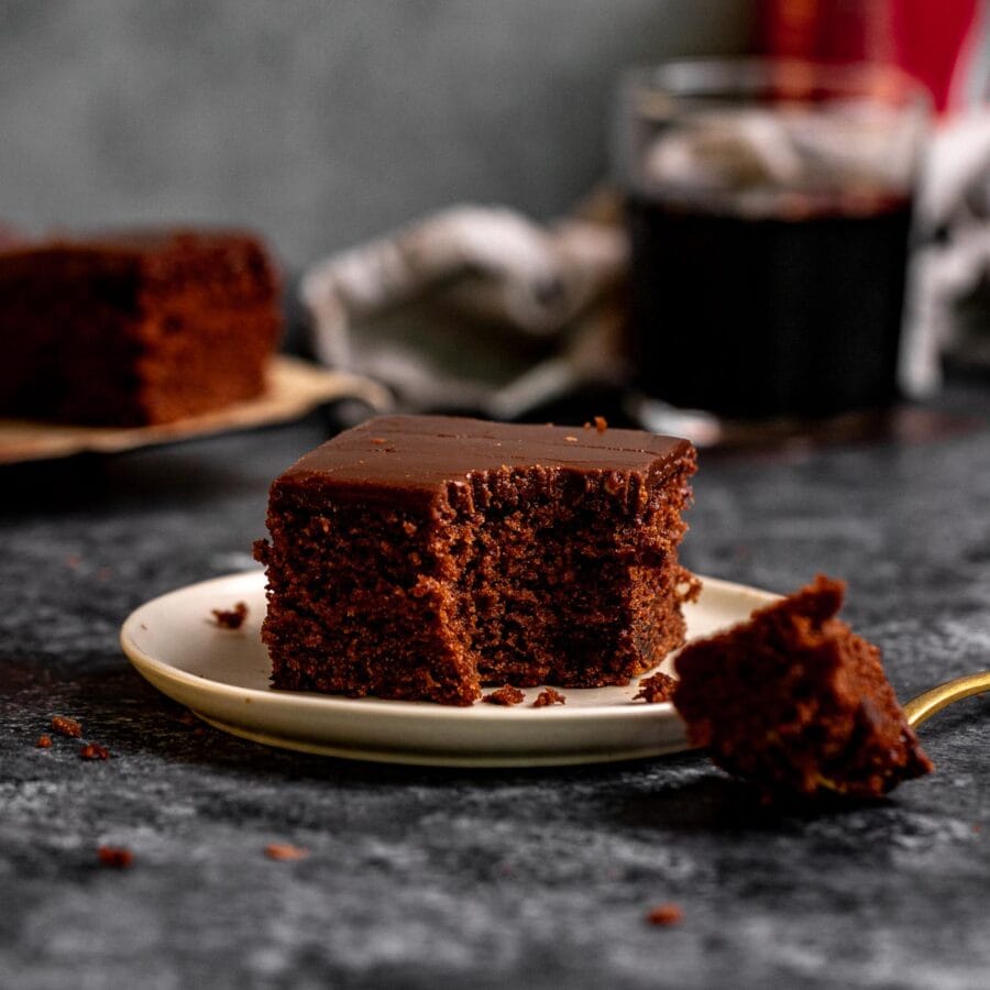Coca Cola Sheet Cake slice on plate with fork