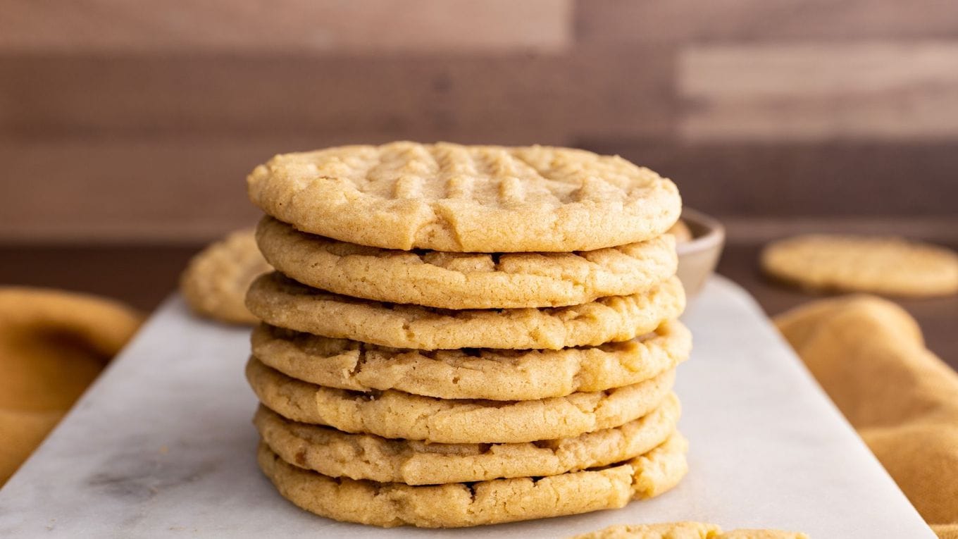 Crispy Peanut Butter Cookies in a stack on serving plate