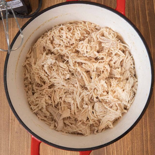 Easy Shredded Chicken in pot with electric mixer