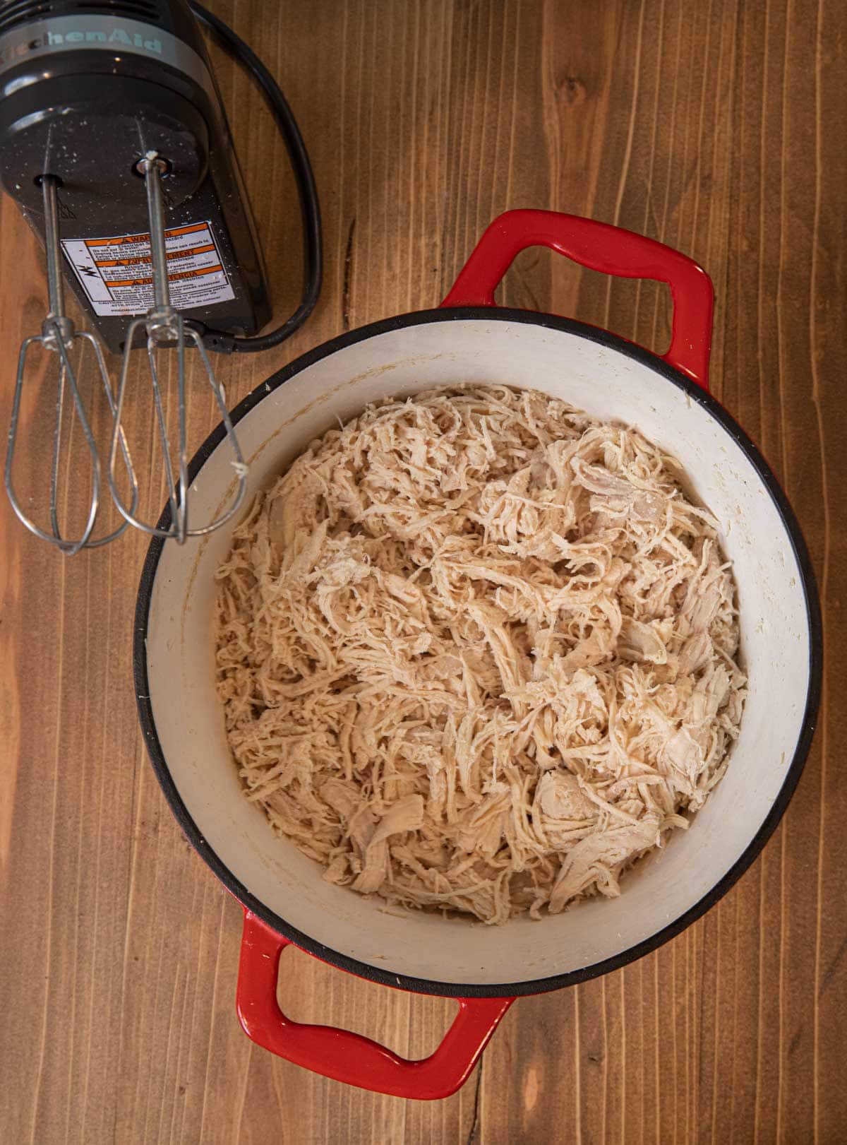 Easy Shredded Chicken in pot with electric mixer