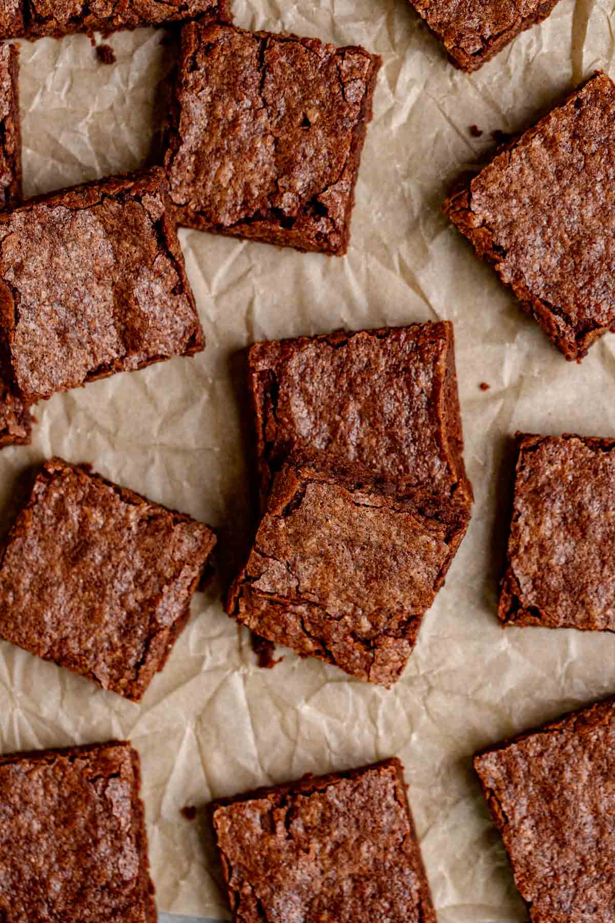 Fudgy Brownies sliced on parchment