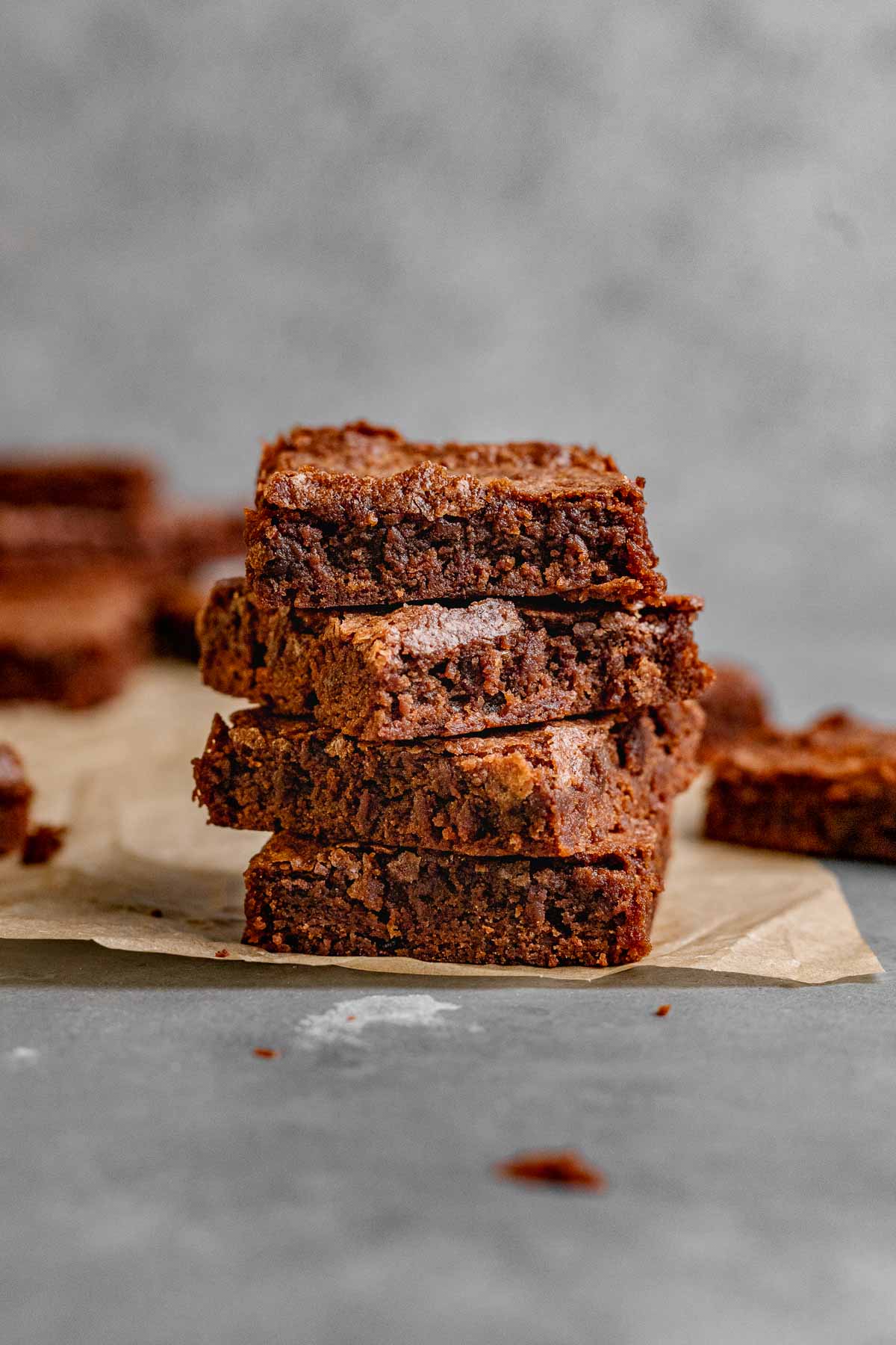 Fudgy Brownies sliced on parchment