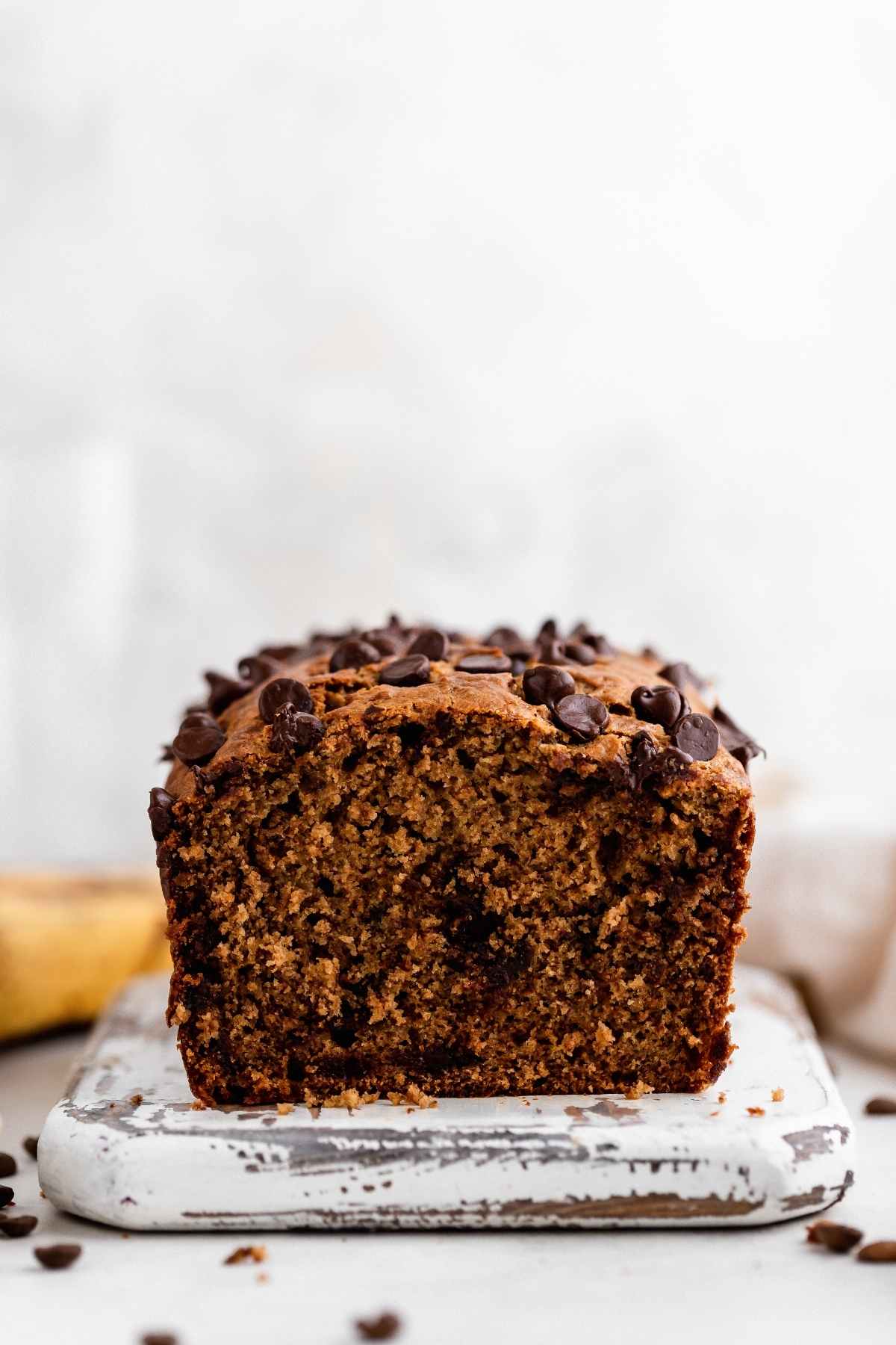 Mocha Chip Banana Bread sliced on board