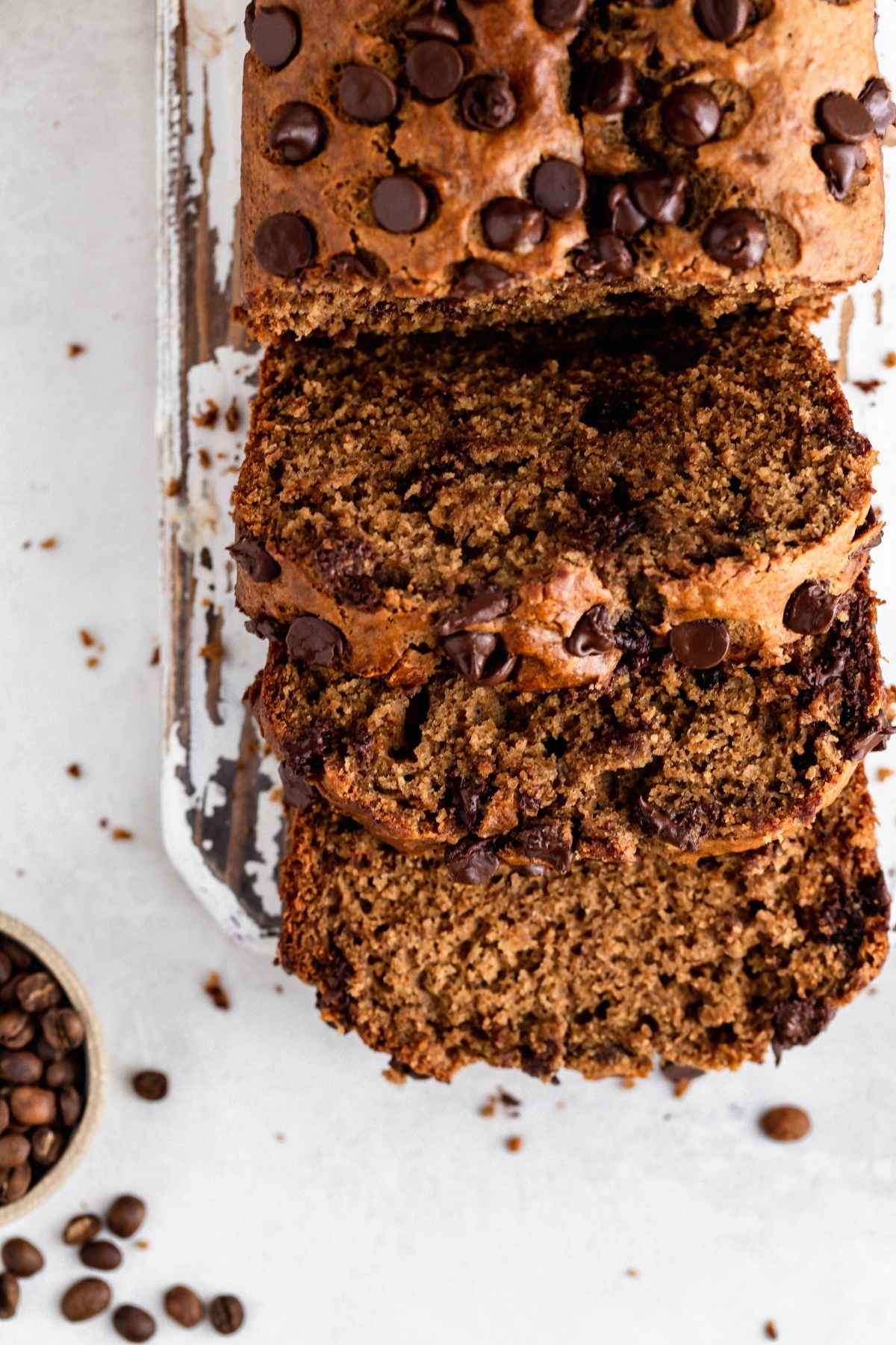 Mocha Chip Banana Bread sliced on board