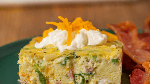 Serving of food on a green plate
