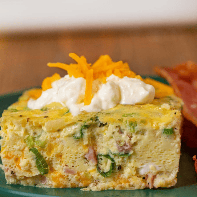 Serving of food on a green plate