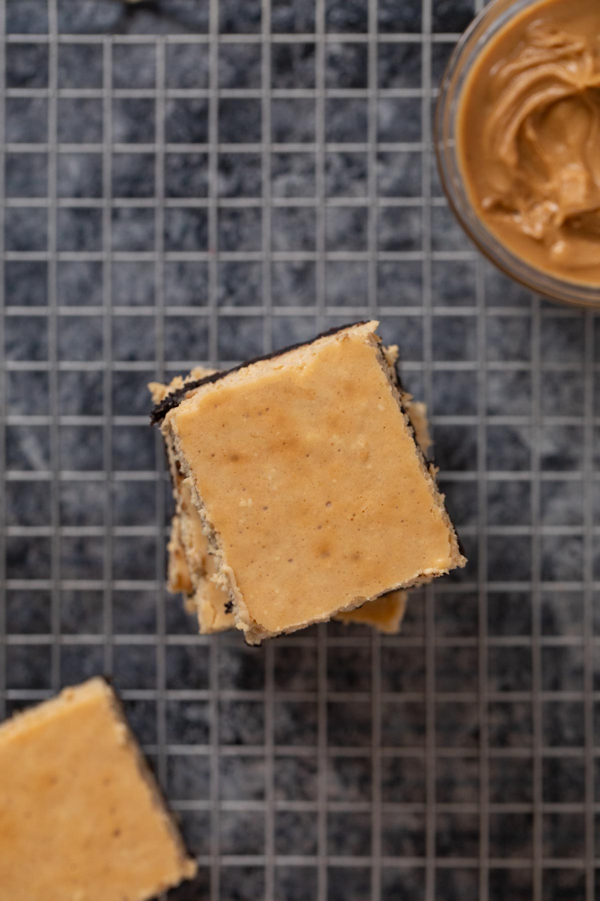 top-down view of Peanut Butter Cheesecake Bars in stack