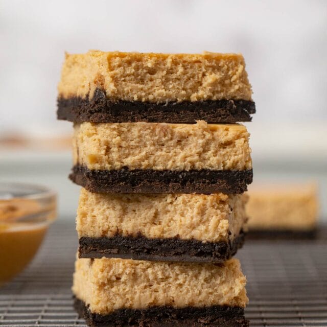 Peanut Butter Cheesecake Bars in stack