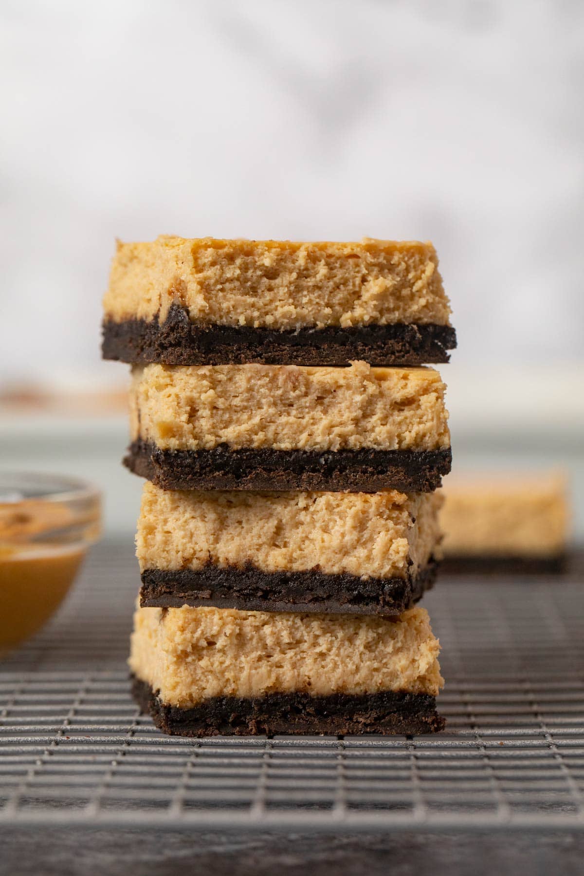 Peanut Butter Cheesecake Bars in stack