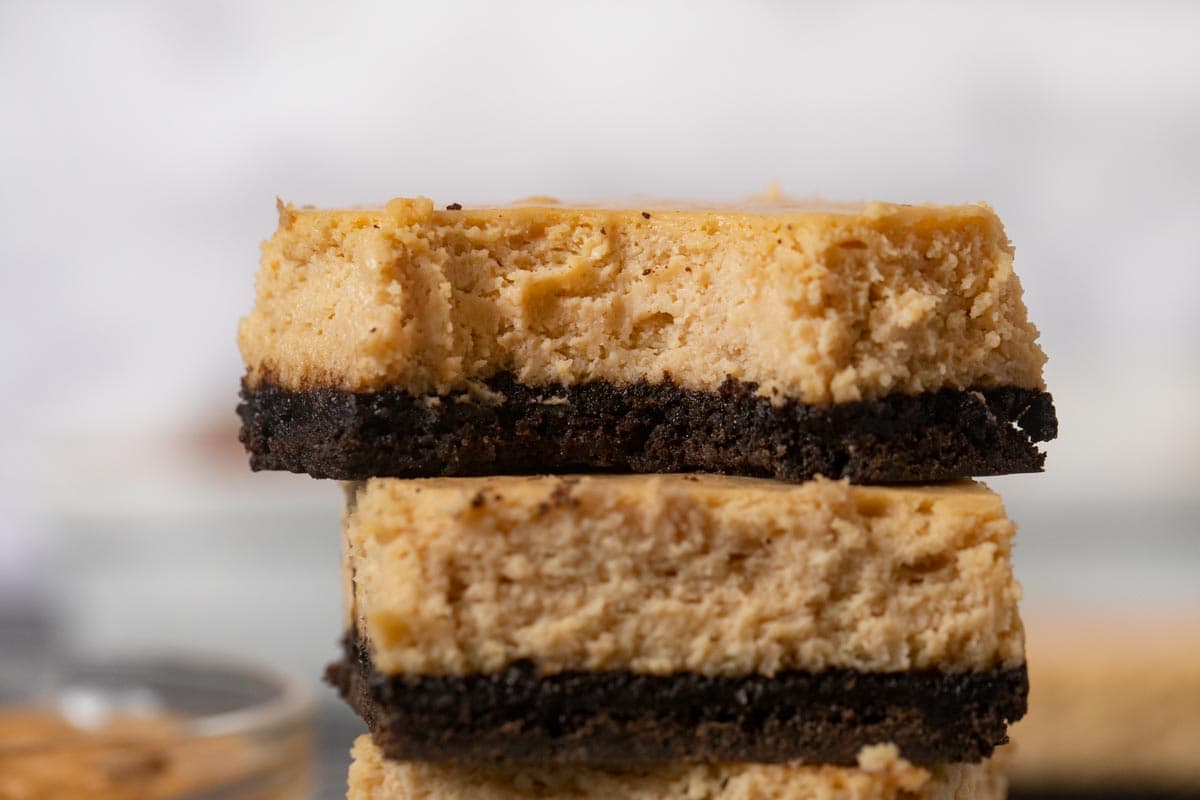 Peanut Butter Cheesecake Bars in stack