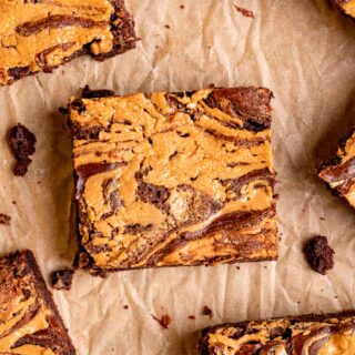 Peanut Butter Swirl Brownies slice on parchment