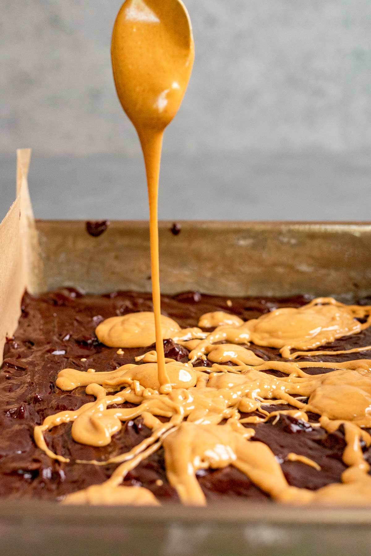 Peanut Butter Swirl Brownies softened peanut butter drizzled on top of batter