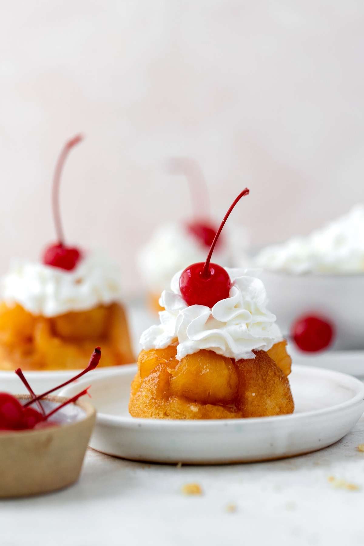 Pineapple Upside Down Cupcakes on serving plate