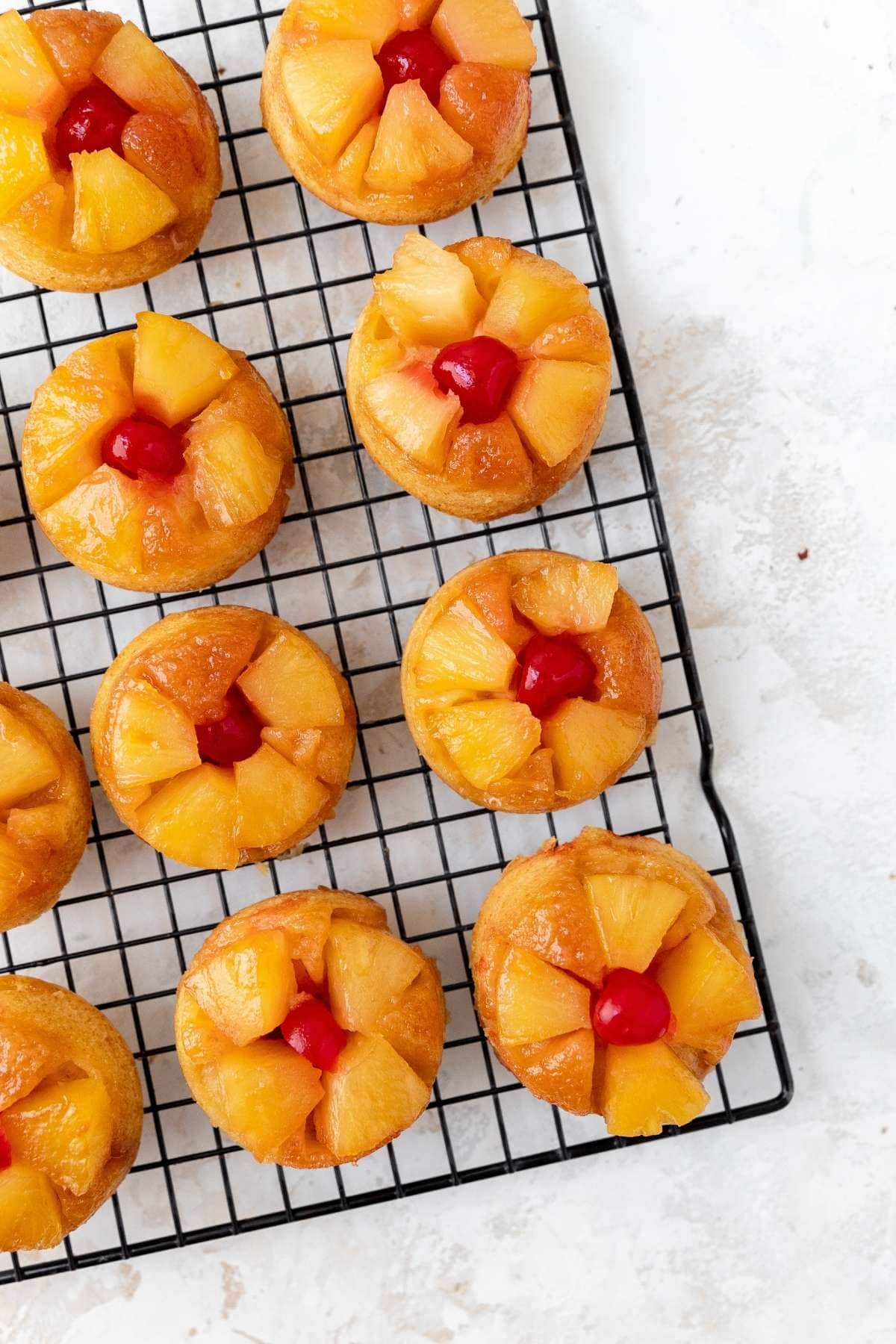 Pineapple Upside Down Cupcakes on cooling rack