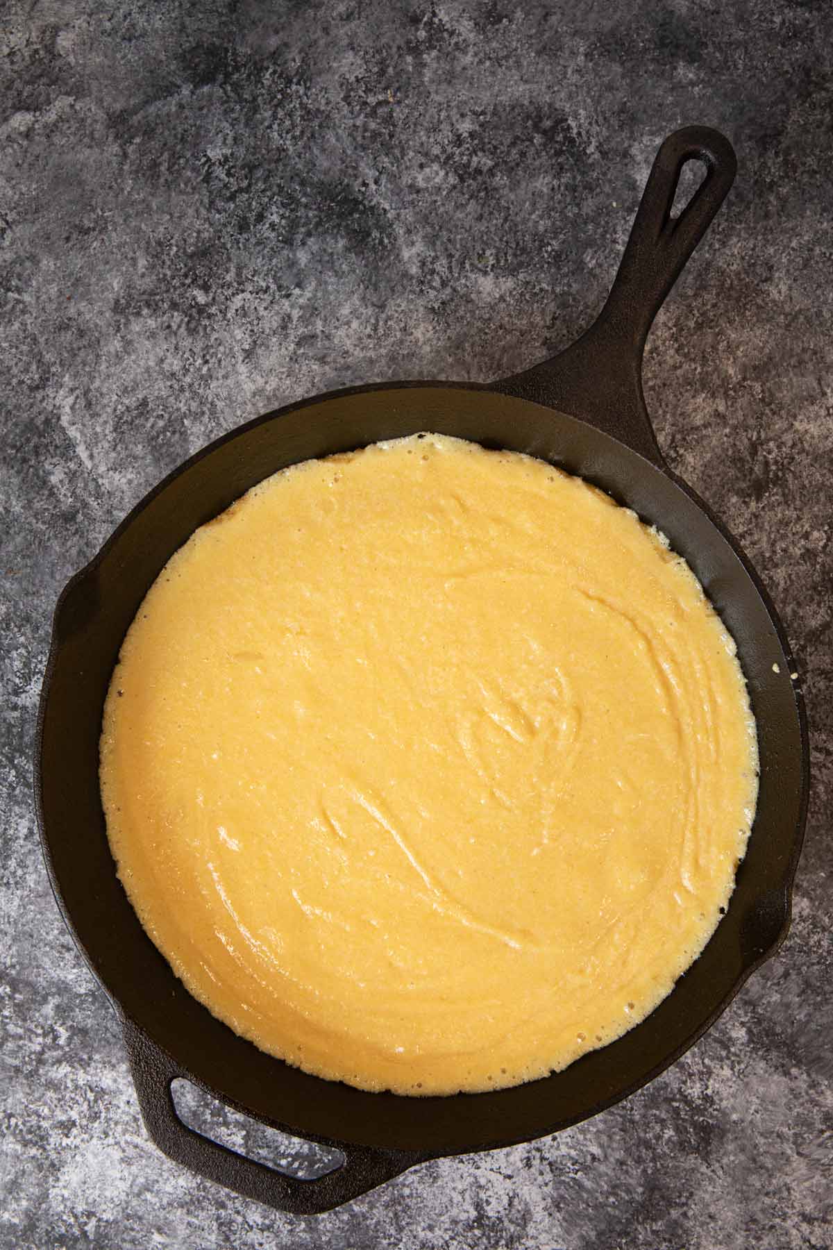 Skillet Cornbread batter in cast iron skillet