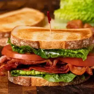 meat and veggies in between two pieces of bread