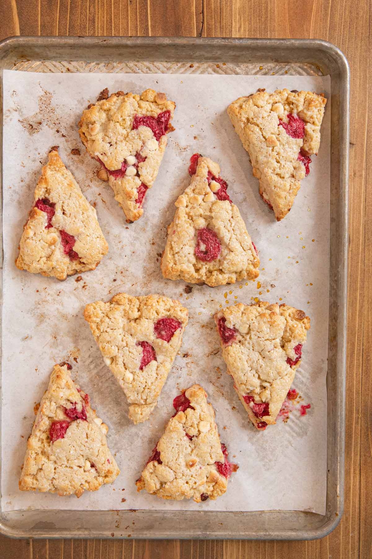 White Chocolate Raspberry Scones on cookie sheet