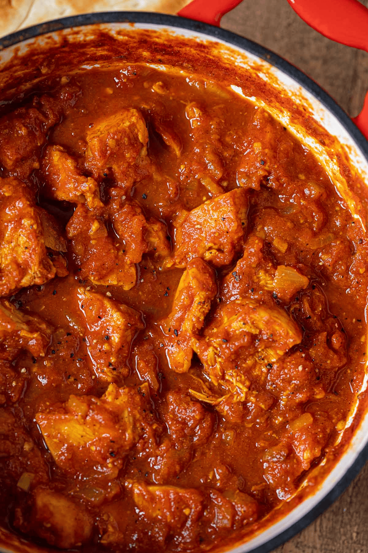 Tender chicken simmered in tomato curry sauce
