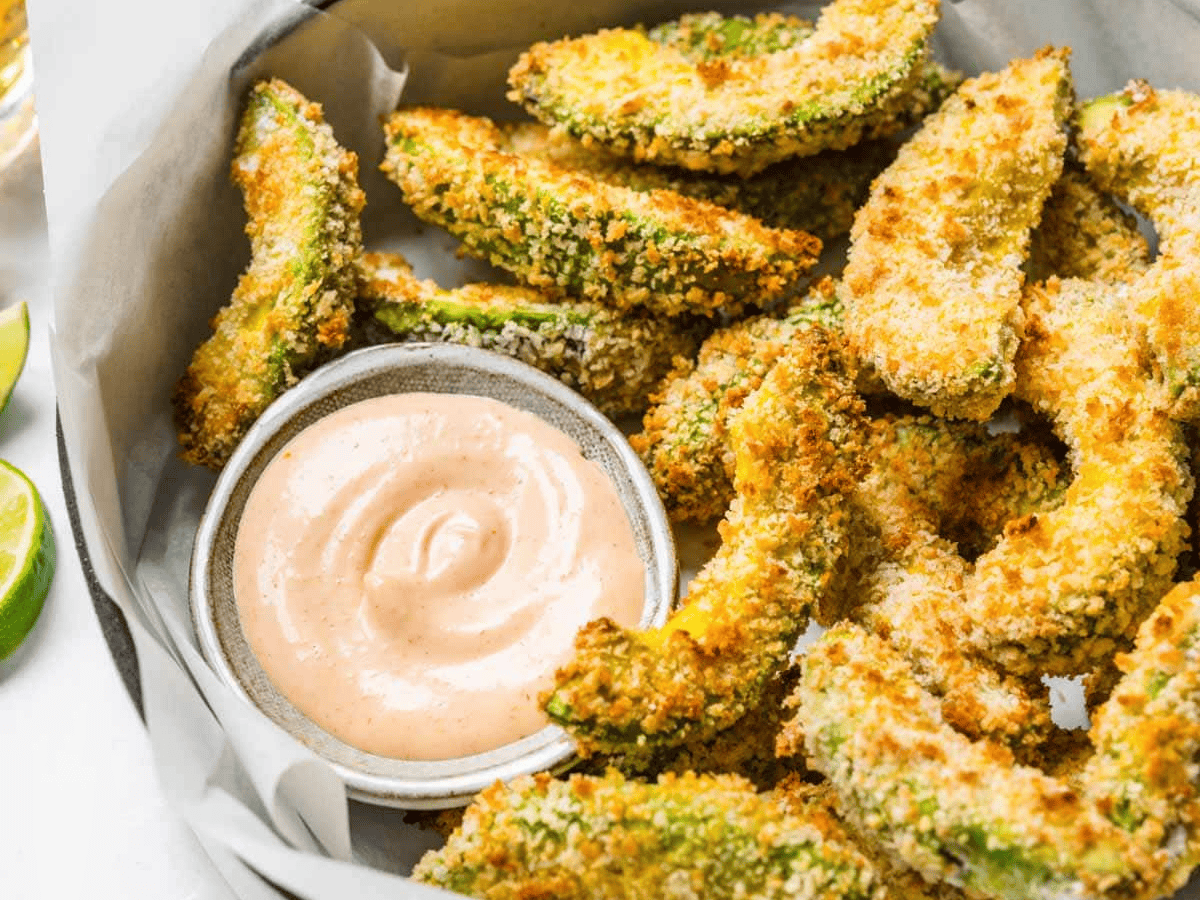 close up fries in a dish with sauce