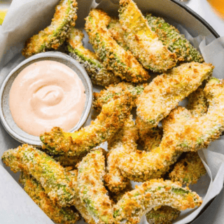 finished fries in basket with sauce