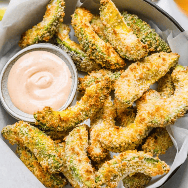 finished fries in basket with sauce